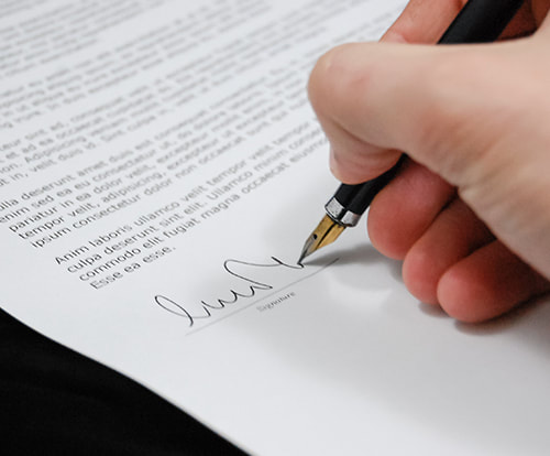 Hand signing legal document